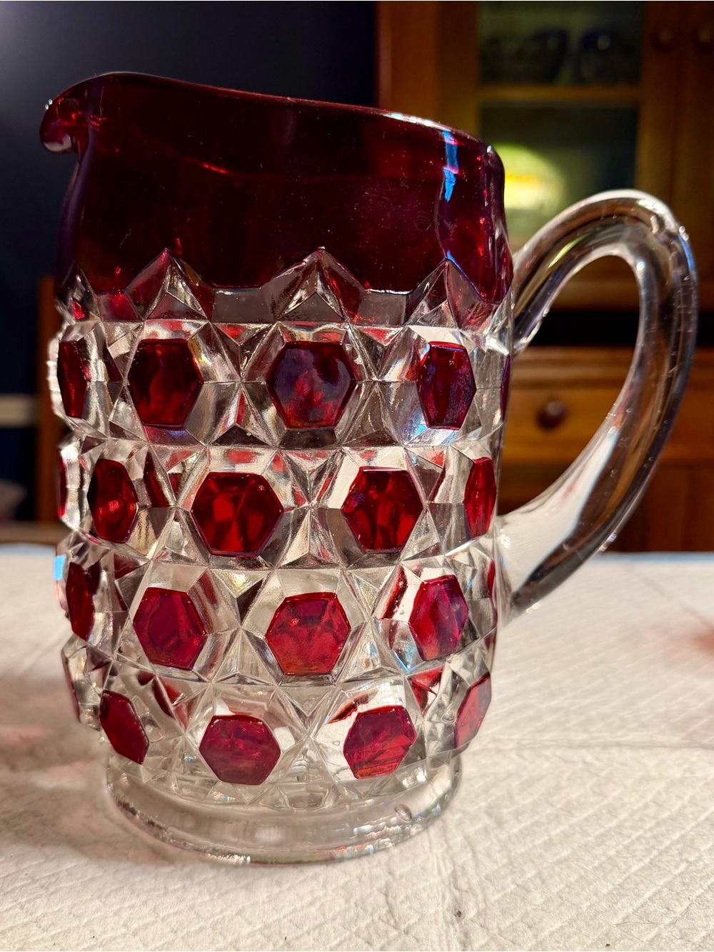 Vintage Ruby Red Glass Pitcher with Embossed Hexagon Pattern made by U.S. glass.